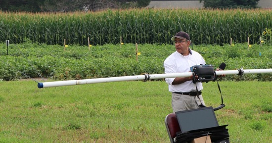 During the Panhandle Ag Research Technology Tour in September 2024, Mohamed Khalil explains how the frequency domain electromagnetic equipment helps with irrigation. (Chabella Guzman/PREEC)