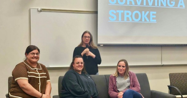  Andela Taylor unread, 11:04 AM (3 hours ago)  to ncta...@lists.nebraska.edu, Natalie Jones, Geitner Simmons, Russell Shaffer, Cheyanne Wood ​​ April 29, 2026                                                                                                                                                                                              NCTA Staff Member Shares Stroke Survival Journey By Andela Taylor | NCTA News Cheyanne Wood was supposed to go to her cousin’s baby shower that morning. Instead, she found herself standing at her kitchen sink, feeling something she couldn’t explain. “I could feel my blood pressure rising… and then it was like sparks went off in my brain.” Within seconds, the sensation intensified. “It felt like somebody came up behind me, grabbed my spinal cord and ripped it out of my body.” Disoriented and in pain, she searched her symptoms. Stroke. She called 911. “I’m 31. I think I’m having a stroke. Please hurry.” Emergency responders arrived to find her alone with her children. While arrangements were made for their care, Cheyanne’s condition worsened. She began vomiting before the ambulance even left. From there, everything moved fast. A helicopter was called. Medical teams prepared for immediate transport. Somewhere between the ambulance and the flight, reality began to blur. “I’m Cheyanne… I think I had a stroke this morning.” “I think you’re having one right now.” That was one of the last moments she clearly remembers. On Nov. 15, 2025, Cheyanne suffered a hemorrhagic stroke, a type of stroke caused by a ruptured blood vessel in the brain. Though less common than ischemic strokes, hemorrhagic strokes are often more severe and can become life-threatening within minutes. “About 35–52% of patients don’t survive a hemorrhagic stroke, many within days or weeks,” she later shared. “I survived.” She spent three days in intensive care and 16 days in inpatient rehabilitation. When she began to understand what had happened, the reality was stark. She had lost motor control on the left side of her body and part of her vision. In those early days, one thing stood out clearly—gratitude. “I am so grateful for the paramedics, the nursing staff, and the doctors at CHI Good Samaritan. They took very good care of me.” Her recovery didn’t happen all at once. It came in phases. A Recovery Measured in Milestones Chey’s recovery unfolded over time—each phase building strength, independence and confidence. Within two weeks: Began walking again, covering short distances without a walker and starting treadmill work in therapy. She also regained independence in essential daily tasks. By three weeks: Discharged from inpatient rehabilitation and returned home to her family. Around one month: Reached key physical and emotional turning points, including regaining vision in her left eye. By six to eight weeks: Focused on rebuilding balance, coordination and core strength while improving overall mobility. At two months: Returned to work on a part-time basis, marking a major step toward a normal routine. Beyond two months: Advanced from walking to light jogging, setting goals to improve movement on her left side. As the weeks passed, the milestones became less about firsts and more about strength, endurance and perspective. But her journey didn’t stop at recovery. It turned into purpose. On March 24, Chey organized and hosted a campus event at the Nebraska College of Technical Agriculture focused on stroke awareness, stress and mental health. What began as a planned panel evolved into a conversation centered on recognizing stress in others and understanding the warning signs of stroke. “We all know the saying, ‘See something, say something,’” she shared. “I think it should be, ‘See someone, support someone.’” In March, she also reached another milestone by returning to work more regularly, continuing to rebuild both physically and mentally. At the same time, recovery has remained an ongoing process. Recent updates reflect continued medical follow-up, including lab work, testing and monitoring related to brain function. She has also been open about the emotional side of recovery. After experiencing a headache, she shared the anxiety that followed—the immediate fear that it could signal another stroke. In that moment, something as simple as relief from medication brought reassurance, but also highlighted the lasting mental impact of what she had endured. More recently, she has asked for continued prayers as she works through challenges related to thalamus function—another reminder that recovery is not always linear. Today, more than four months into recovery, Chey continues to push forward, focused not only on regaining strength, but on helping others recognize the importance of awareness, support and early action. “Know the warning signs. Be prepared. B.E.F.A.S.T. Knowing this could save someone’s life—or your own. It saved mine.” Her journey is still unfolding, shaped by resilience, perspective and determination. “I will never give up on myself—because I am worth it.” Cheyenne continues to share her progress on her Facebook page @Chey Lynne Wood.  Cheyenne Wood presents her stroke story at NCTA, along with the panel she organized with Ambience Counseling licensed mental health professional, Kristina Messersmith, and Eustis EMTs Lacey Parker and Becky Busboom. P/C J. McConville  