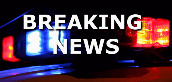 Police car light bar with the words Breaking News overlaid.